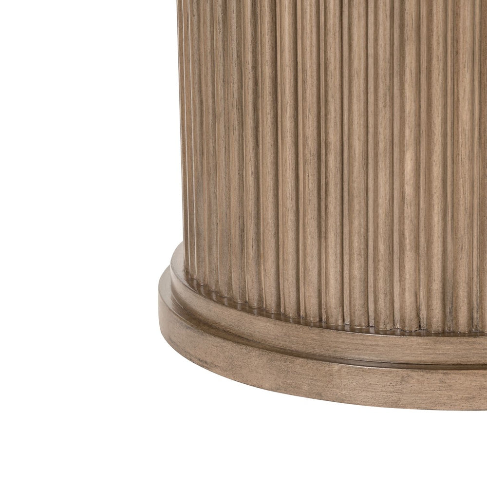 Close-up of fluted wood chairside table base with warm natural finish and farmhouse style detail.