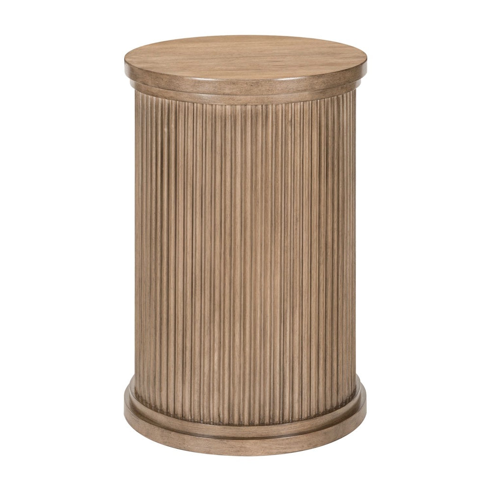Round wood chairside table with fluted pedestal base in a warm natural farmhouse finish.