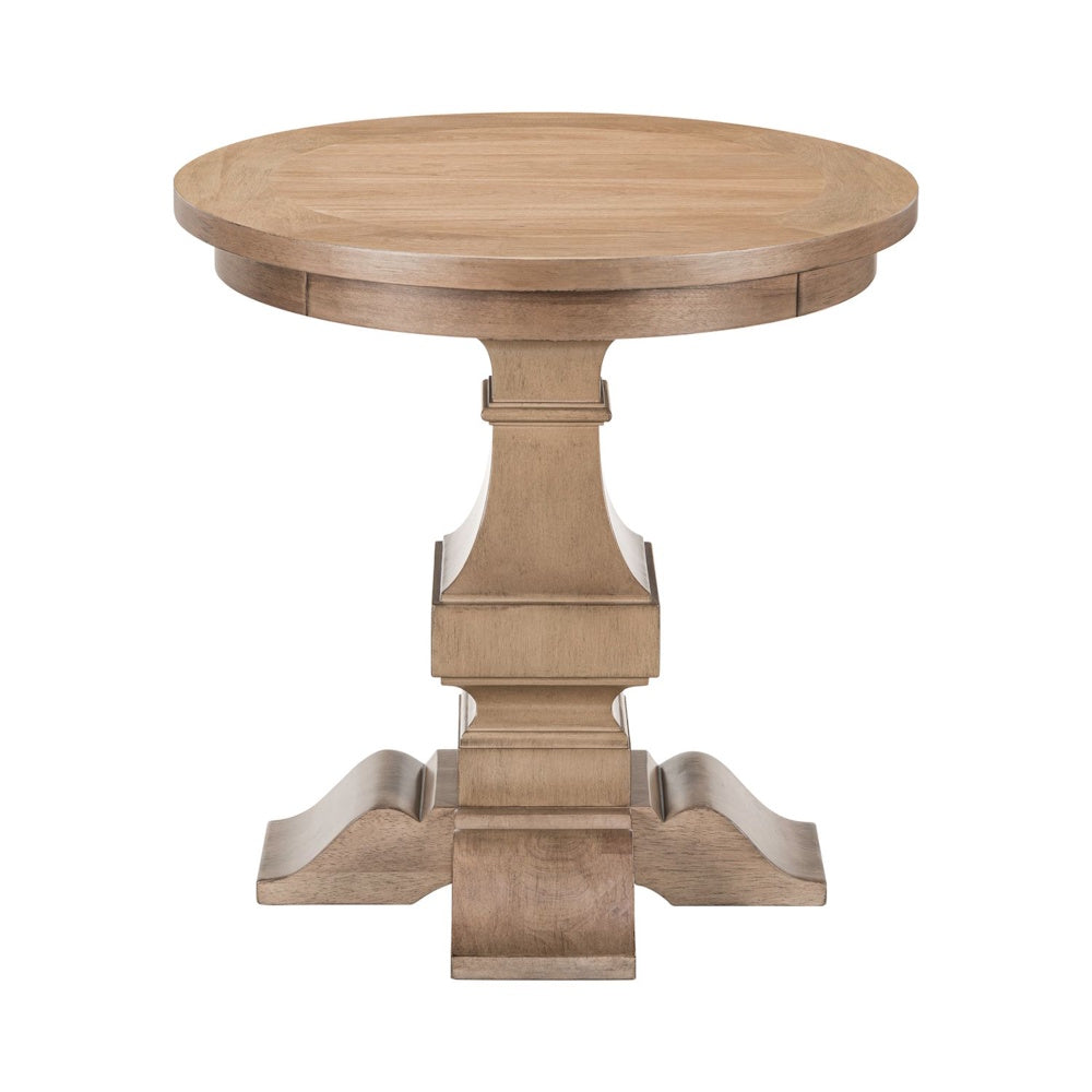 Front view of round wooden end table with pedestal base and carved feet in natural finish.