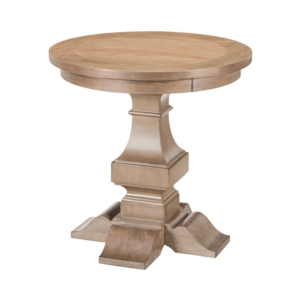 Round wooden pedestal end table with carved base in a light natural finish.