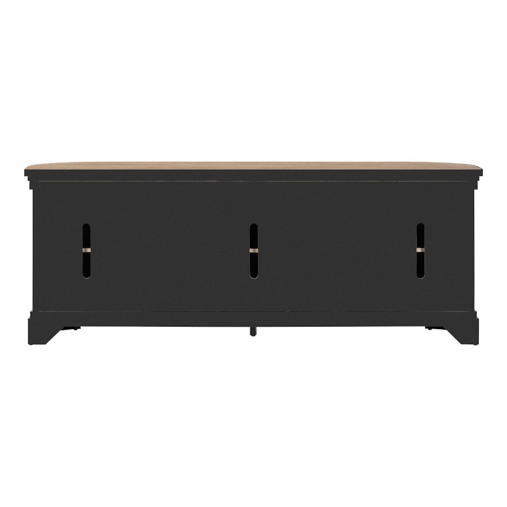 Rear view of a black TV stand featuring three vertical cable management cutouts and a wood-tone top surface.