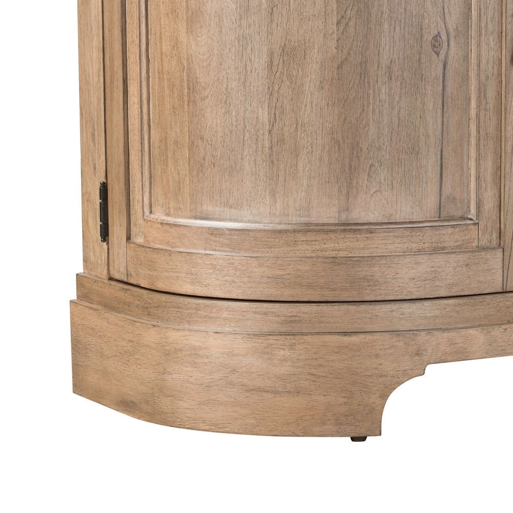 Close-up of a curved light wood furniture base with an arched cutout and black hinge.