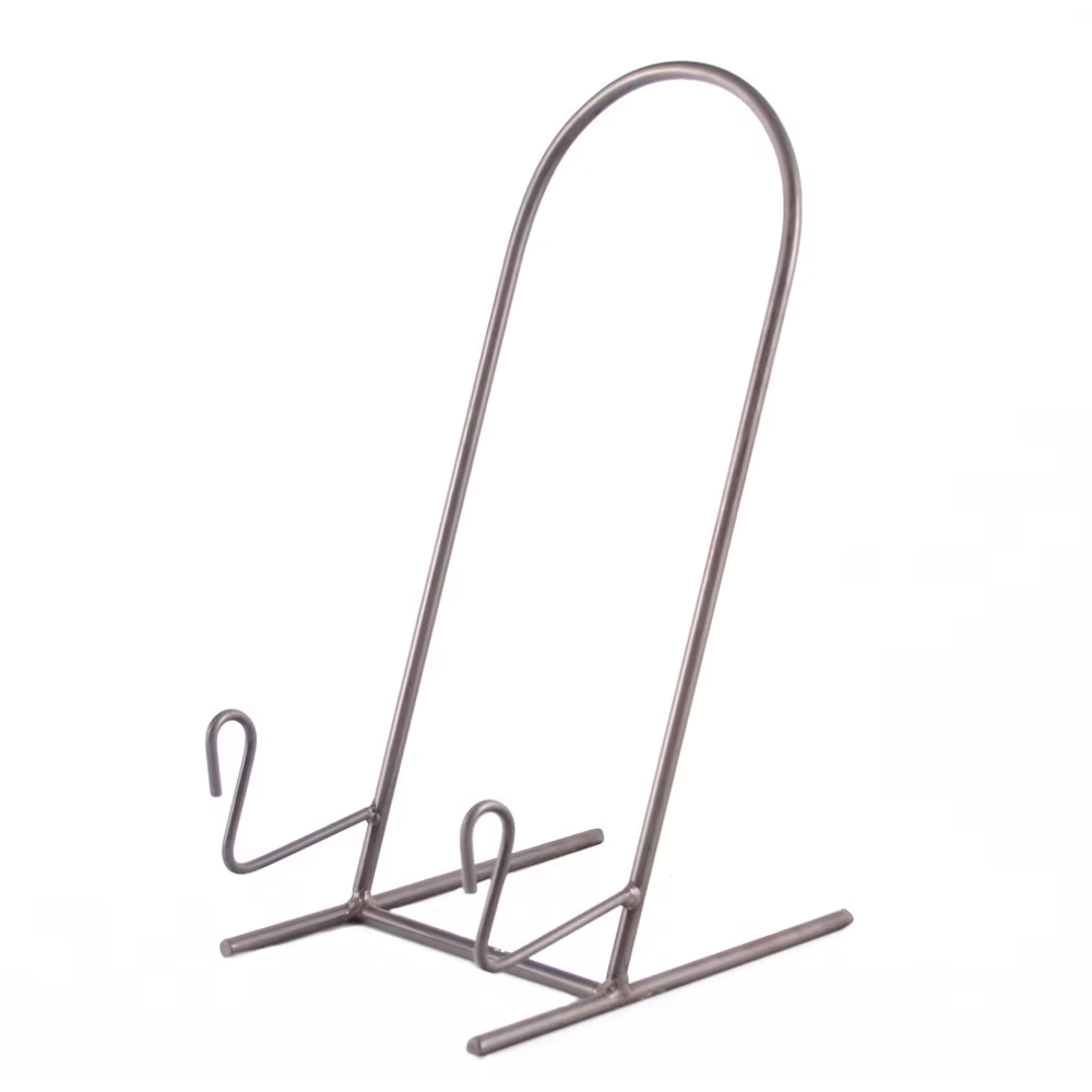 Minimalist dark metal easel display stand with curved support hooks on a plain white background.