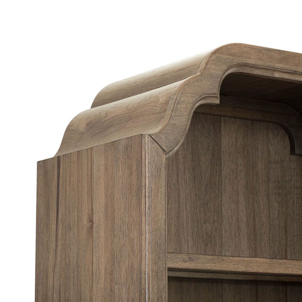 Close-up of a rustic Hickory Grove display cabinet featuring a decorative arched top and natural wood grain.