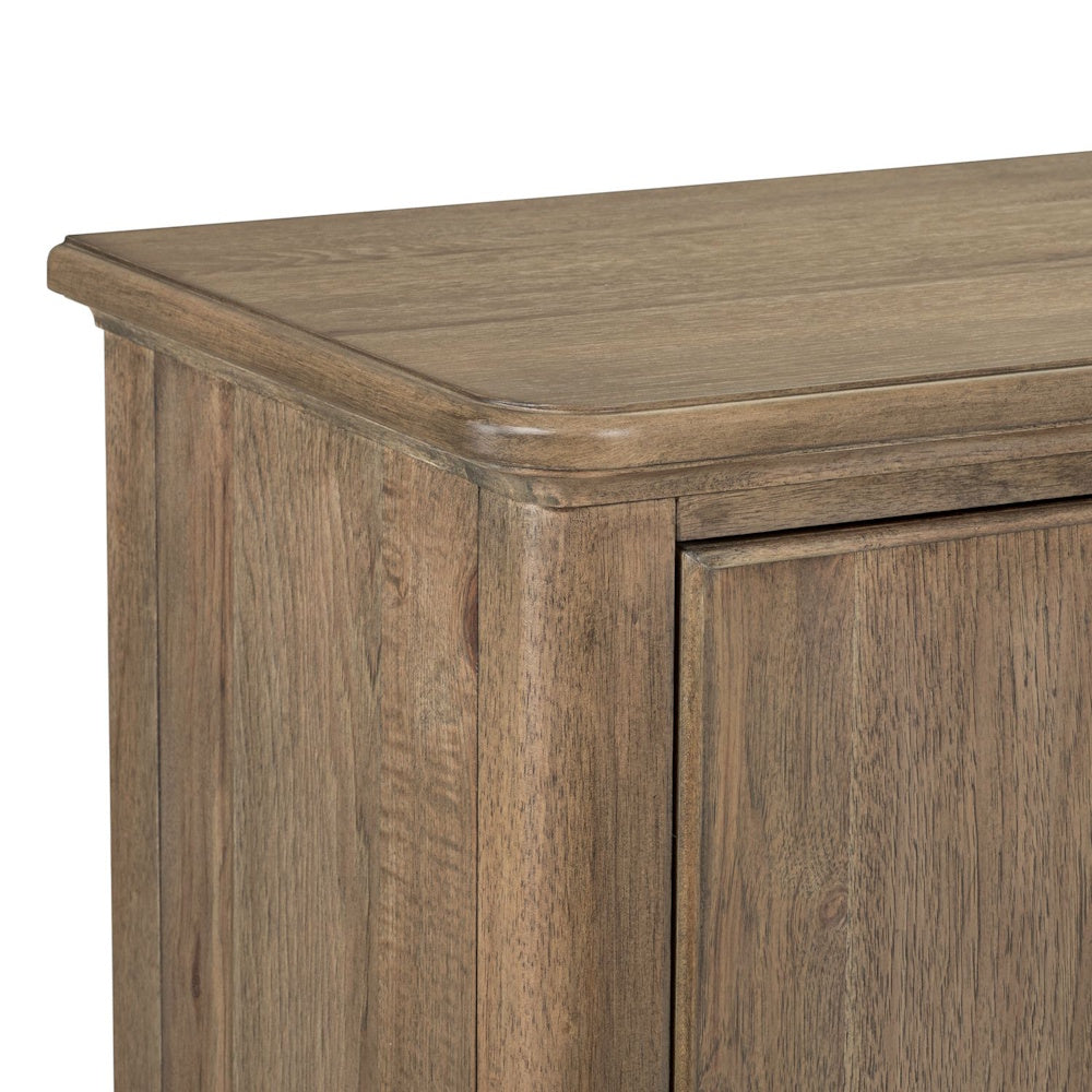 Close-up of a rustic light brown wood sideboard cabinet featuring a rounded corner top and a wood grain finish.