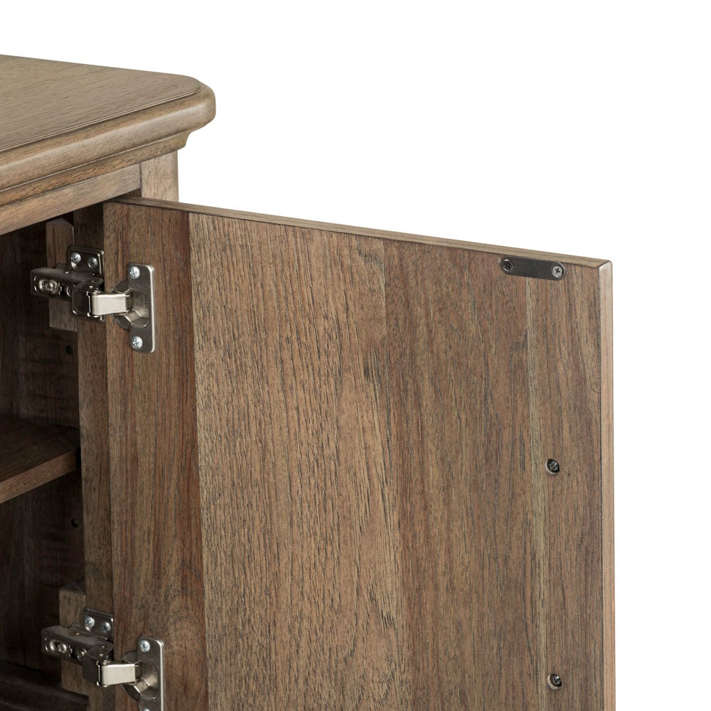 European concealed metal hinges on an open wooden sideboard cabinet door.
