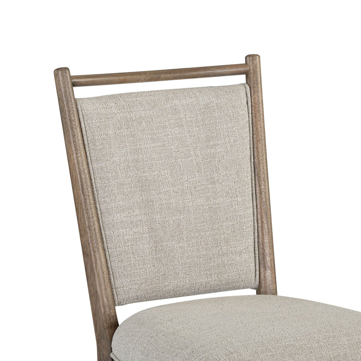 Hickory Grove upholstered dining chair with a textured beige fabric backrest and light brown wooden frame.
