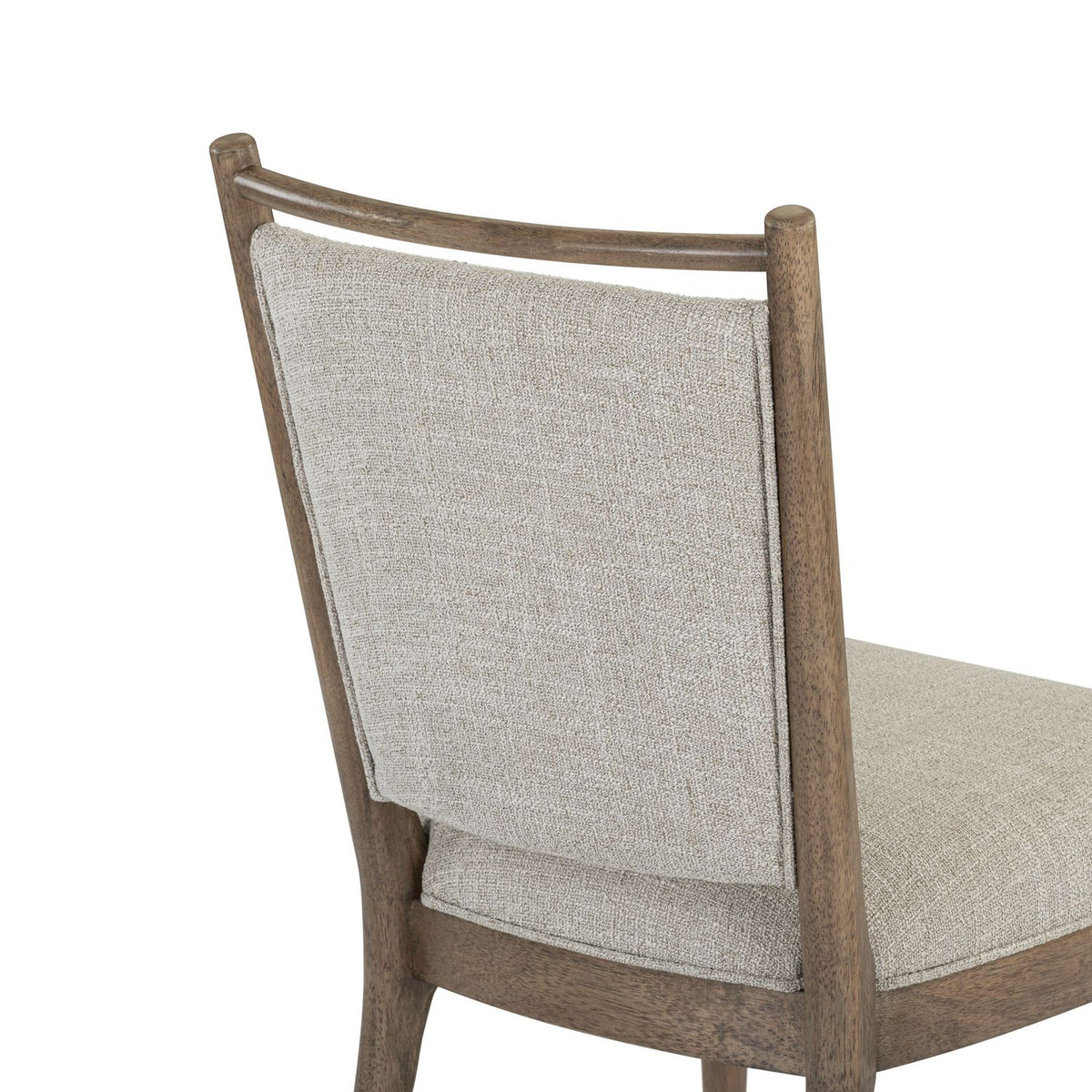 Hickory Grove upholstered dining chair with a textured beige fabric back and a curved wooden frame.