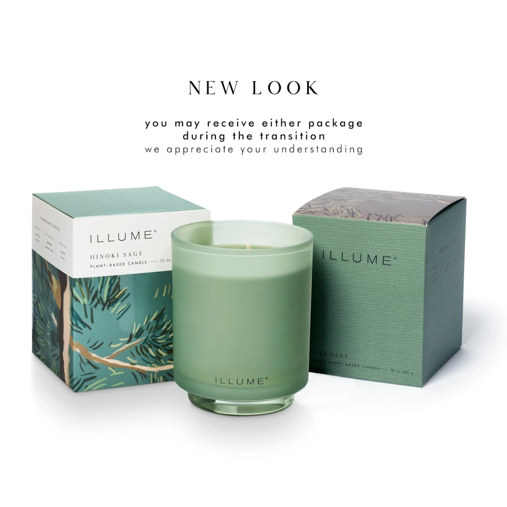 Illume Hinoki Sage candle flanked by its original and updated packaging boxes under a "NEW LOOK" header.