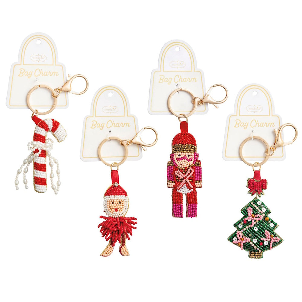 Four beaded holiday bag charms featuring a candy cane, Santa, nutcracker, and Christmas tree.