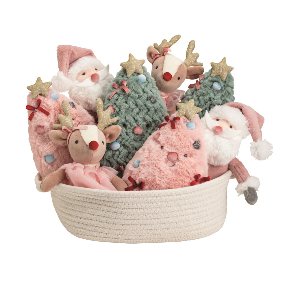 White rope basket filled with plush pink and green Christmas trees, reindeer, and Santa Claus toys for holiday decor.