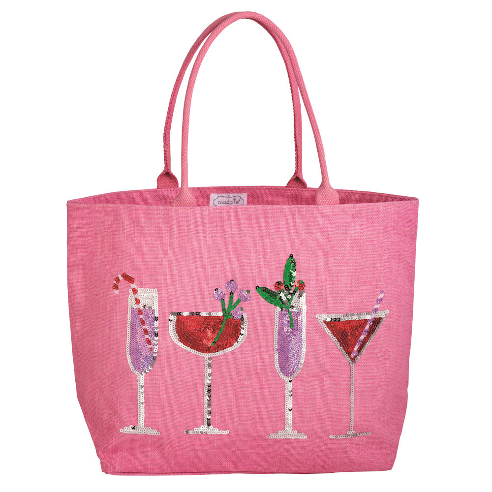 Pink jute tote bag with sequin holiday cocktails, including champagne and martinis.