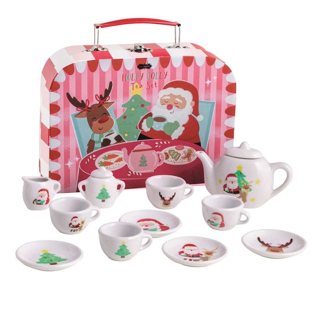 Christmas tea set with Santa and reindeer motifs, including cups, saucers, and a carry case.
