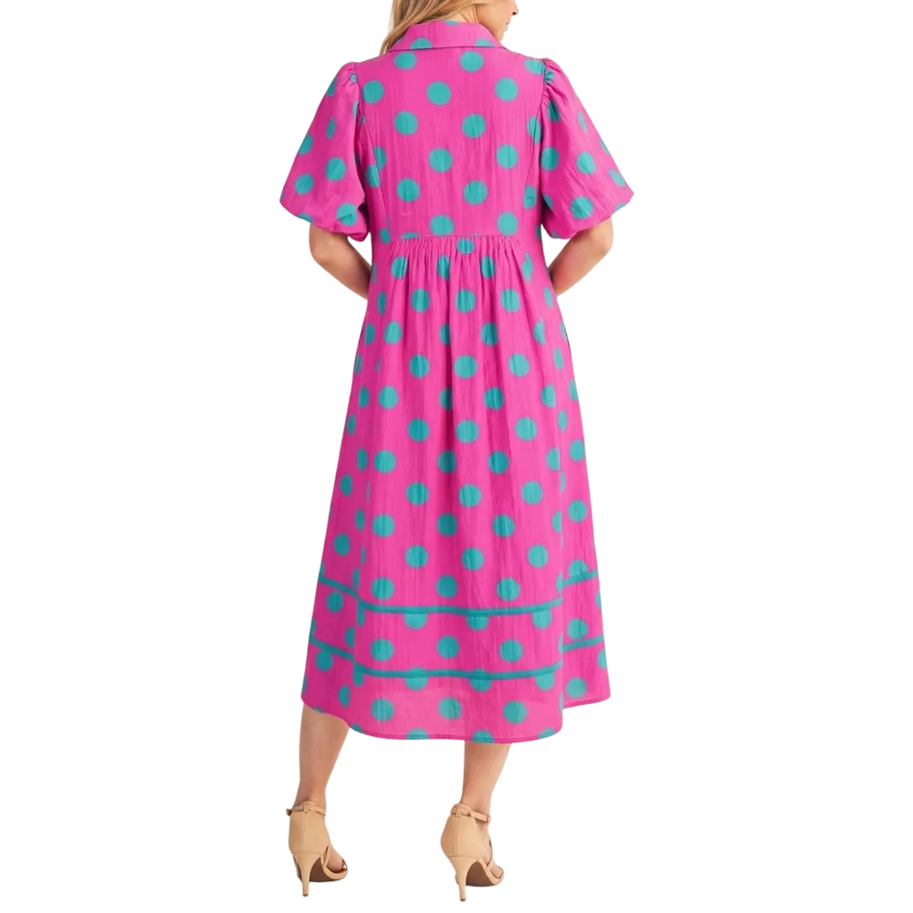 Hot pink midi dress with mint green polka dots and short puff sleeves, back view.