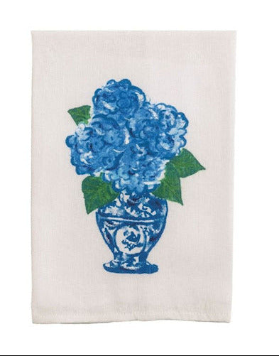 White tea towel featuring a painted blue hydrangea arrangement in a Chinoiserie ginger jar vase.