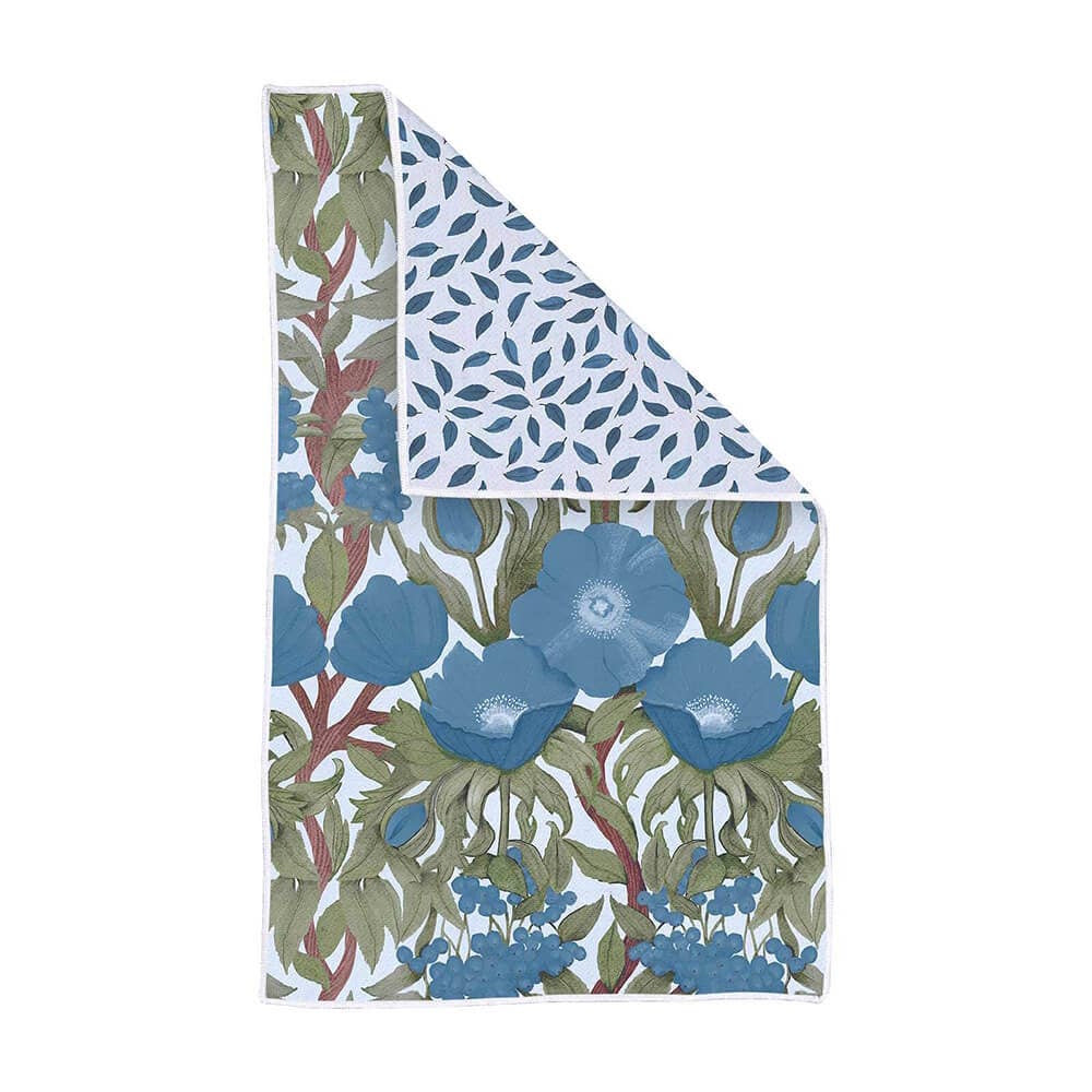 Blue floral kitchen tea towel featuring large Icelandic poppies with a folded corner showing a leaf pattern.