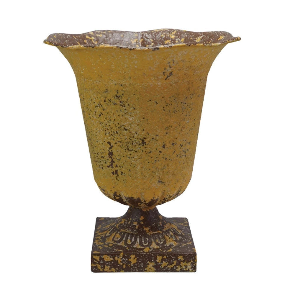 Decorative textured pumpkins in a rustic gold urn vase for autumn home decor.