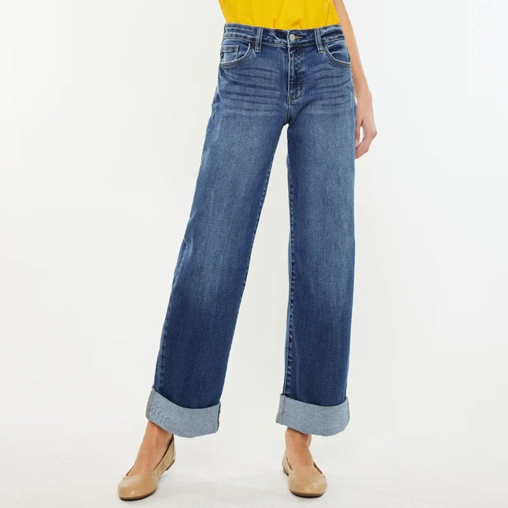 Ivanna Essentials high-rise wide-leg jeans in dark wash denim with cuffed hems, paired with tan flats.