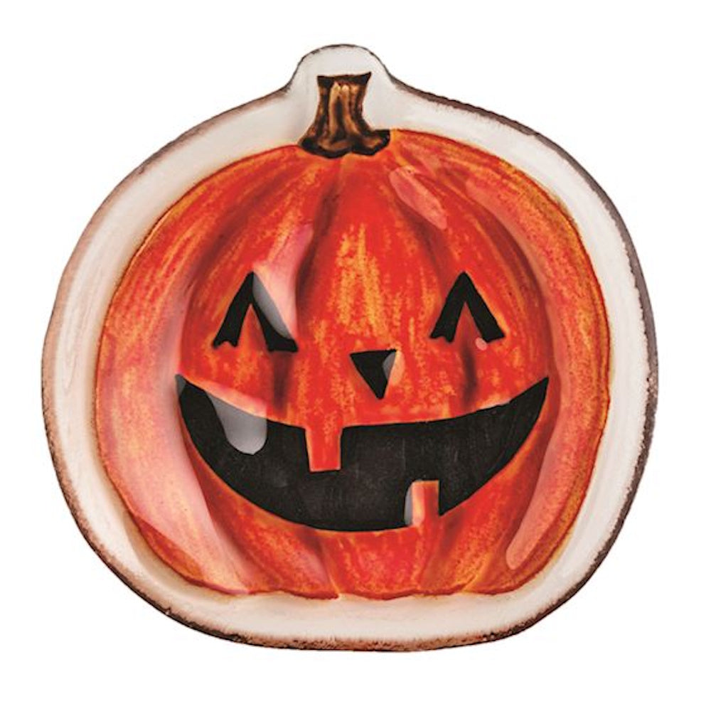 Pumpkin jack-o'-lantern shaped glass Halloween tidbit plate with a smiling face.