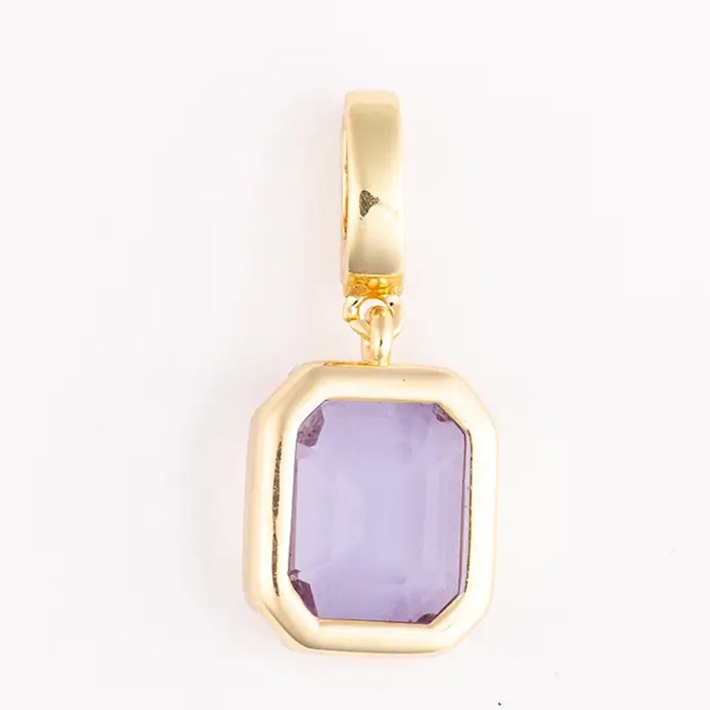 Gold charm featuring a light purple, rectangular emerald-cut gemstone set in a polished gold bezel frame.