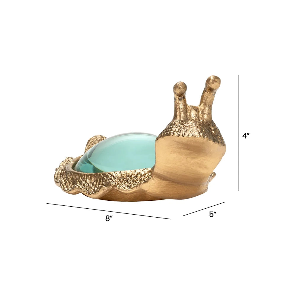 Gold snail sculpture with a blue glass lens shell showing dimensions of 8 inches wide, 5 inches deep, and 4 inches high.