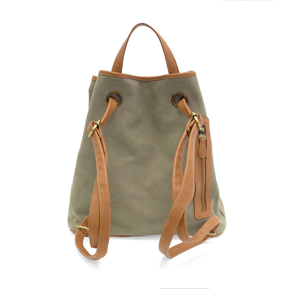 Khaki canvas backpack with brown faux leather straps, top handle, and side zipper pocket on a white background.