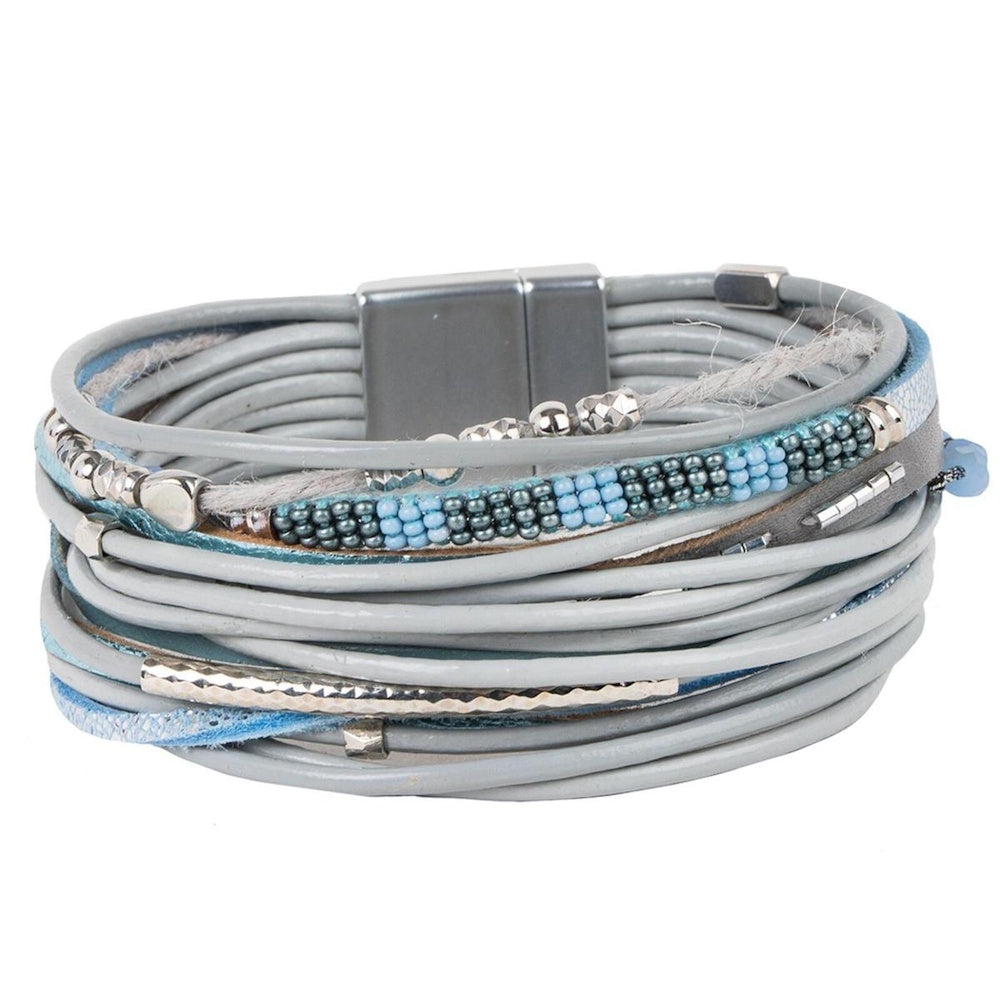 Multi-layer grey leather cuff bracelet with blue and silver beads and a magnetic clasp.