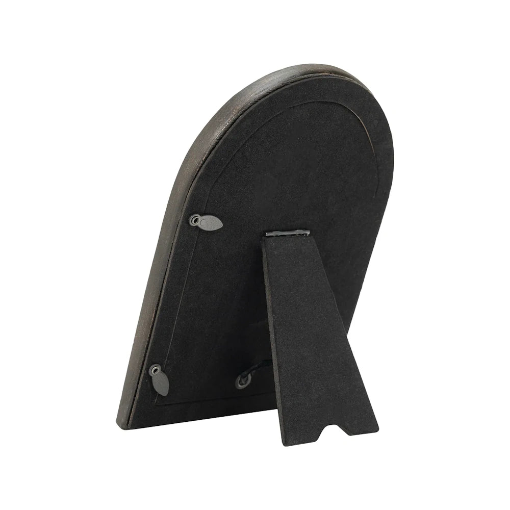 Back of an arched black picture frame with an easel stand and swivel metal turn buttons to secure the photo.
