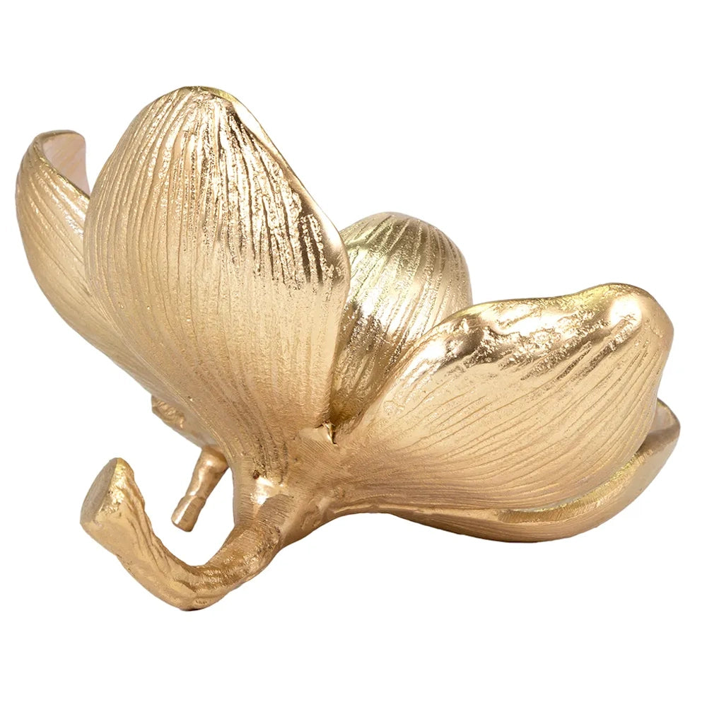 Gold flower sculpture with textured petals and a curved stem base on a solid white background.