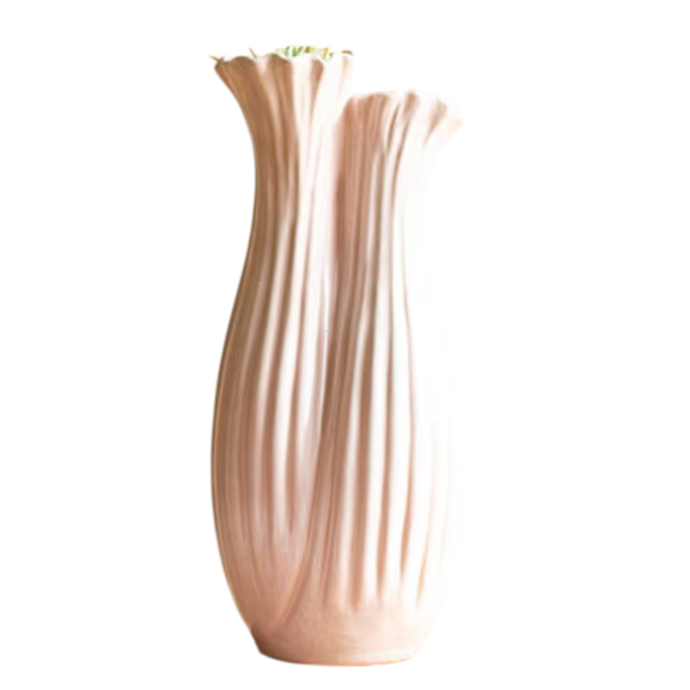 Tall, organic fluted ceramic vase in soft pale pink with a dual-neck design and textured ridges on a white background.