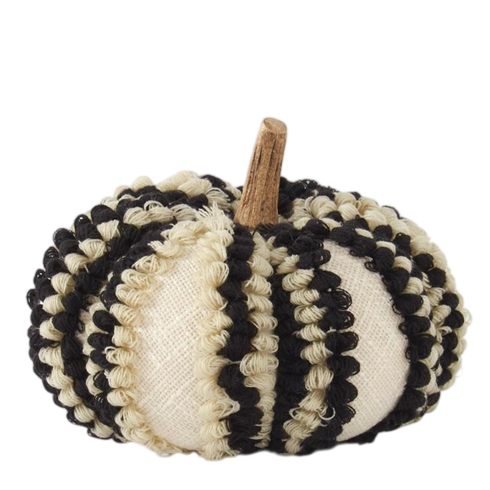 Decorative cream and black textured knit pumpkin with vertical stripes and a wooden stem.