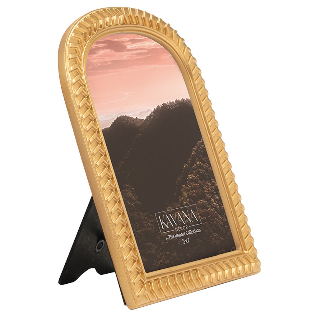 Arched gold 5x7 picture frame by Kavana Decor with textured geometric borders and a sunset mountain photo.