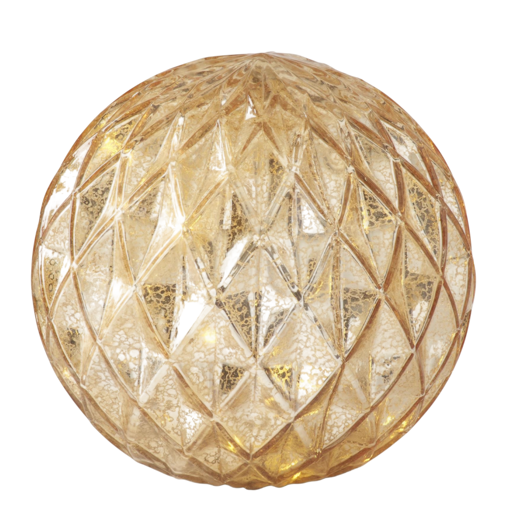 Large glowing gold mercury glass globe with a diamond harlequin pattern on a white background.