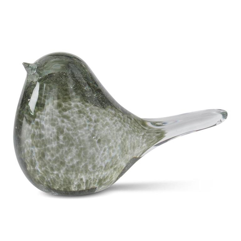 Handblown glass bird figurine with a green speckled interior and clear glass exterior on a white background.