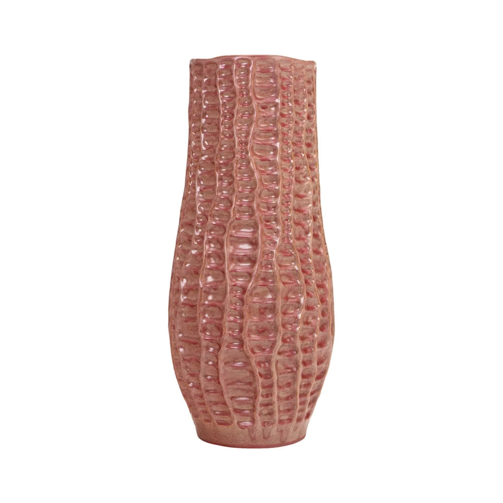 Tall, textured reddish-pink ceramic vase with vertical, bumpy ridges and an organic, wavy silhouette.