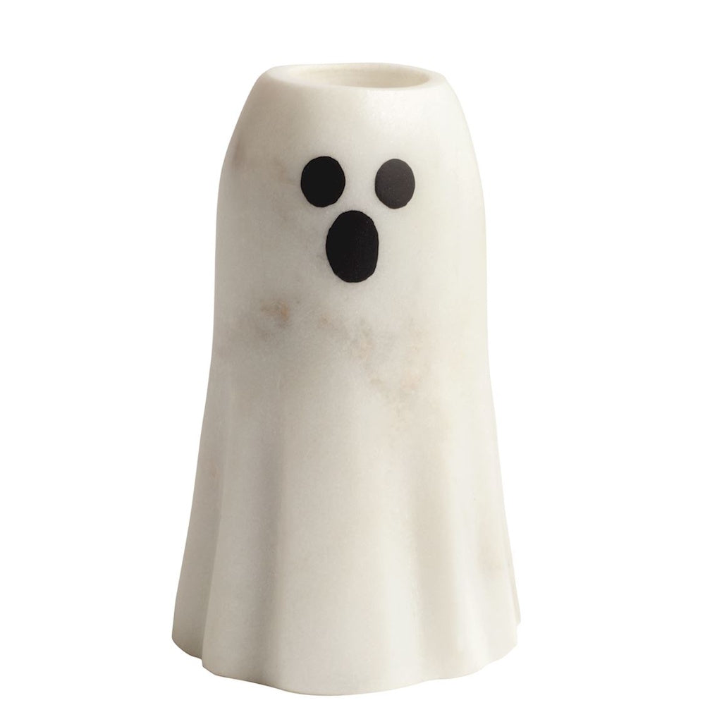 White marble ghost taper candle holder with black eyes and mouth.