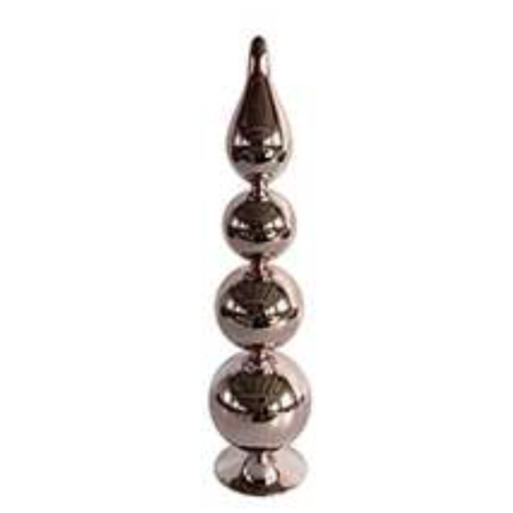 Large pink glass stacked ball Christmas tree figurine from a front view.
