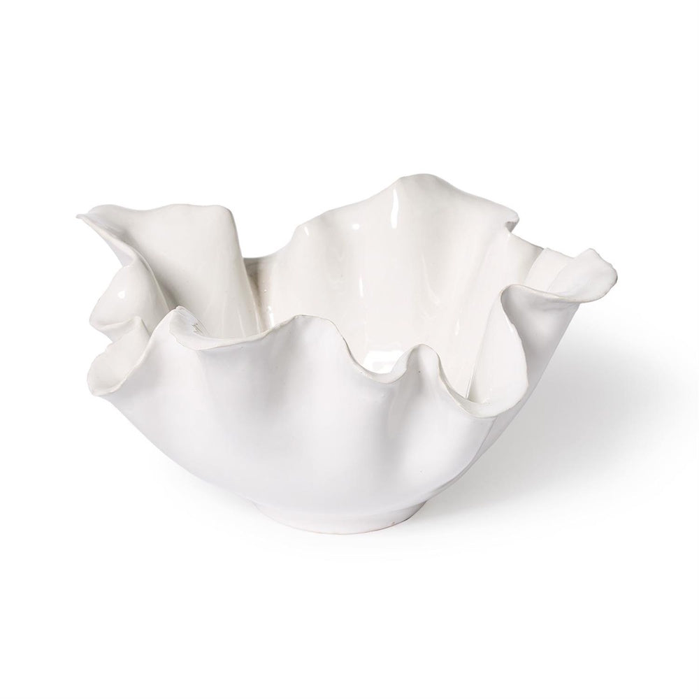 Large white ceramic bowl with a glossy finish and an organic, wavy, ruffled rim set against a plain white background.