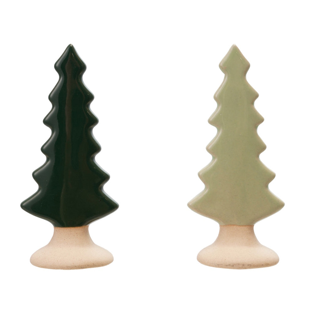 Dark green and light sage ceramic evergreen tree figurines with beige unglazed bases.
