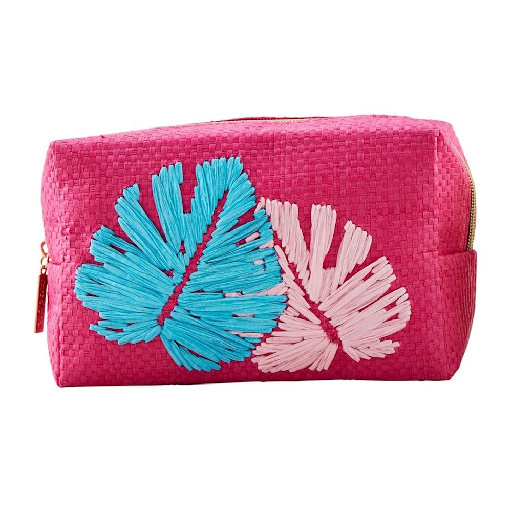 Woven bright pink makeup pouch featuring embroidered blue and light pink tropical palm leaves.