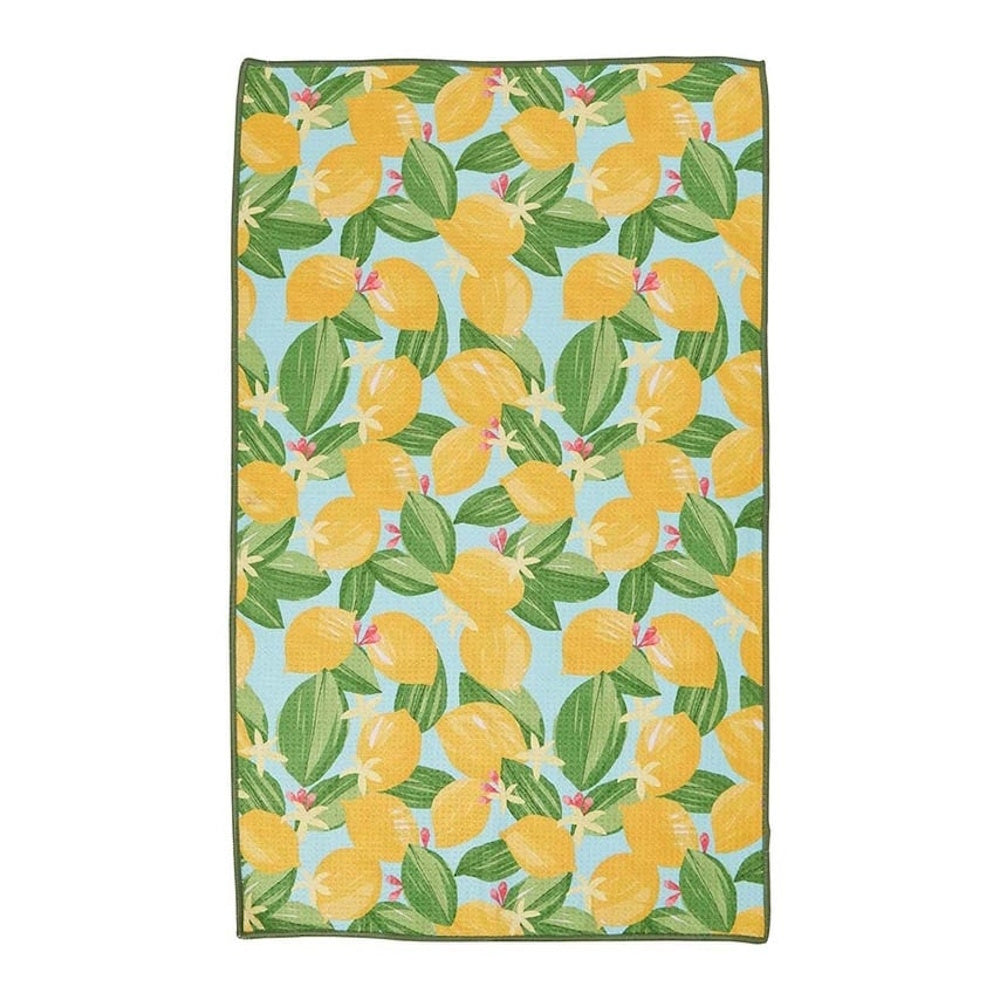 Light blue kitchen tea towel featuring an all-over pattern of yellow lemons, green leaves, and white blossoms.