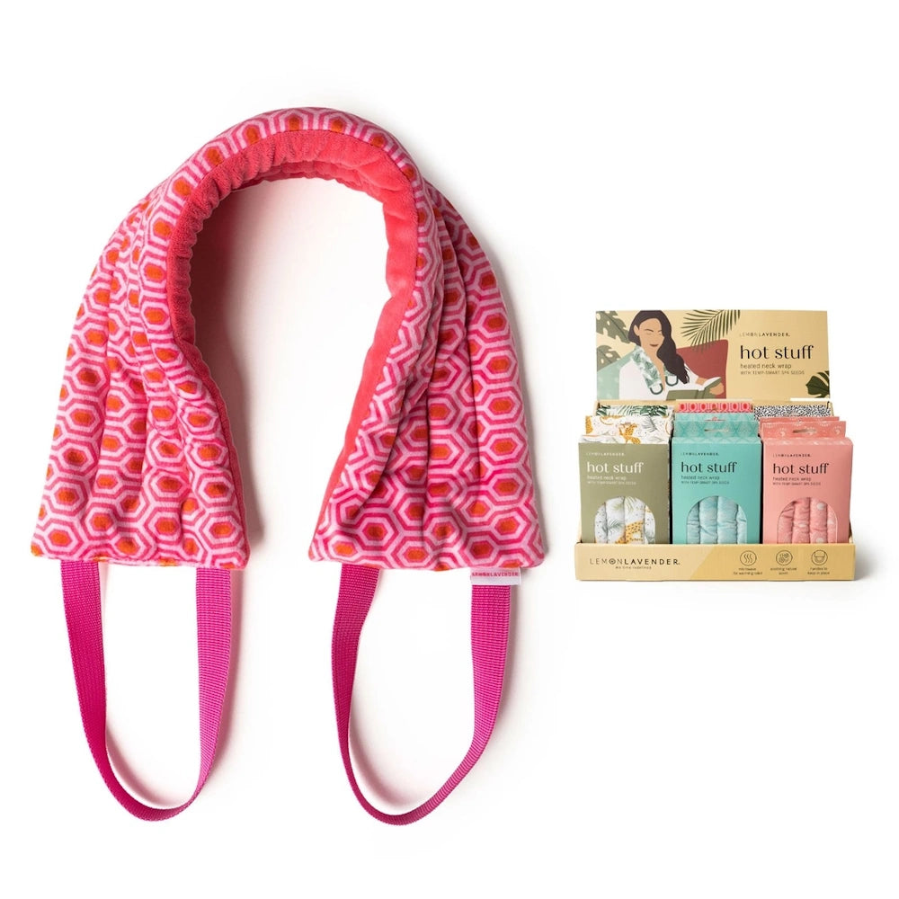 Pink and orange geometric heated neck wrap with pull handles and Lemon Lavender Hot Stuff retail display box.