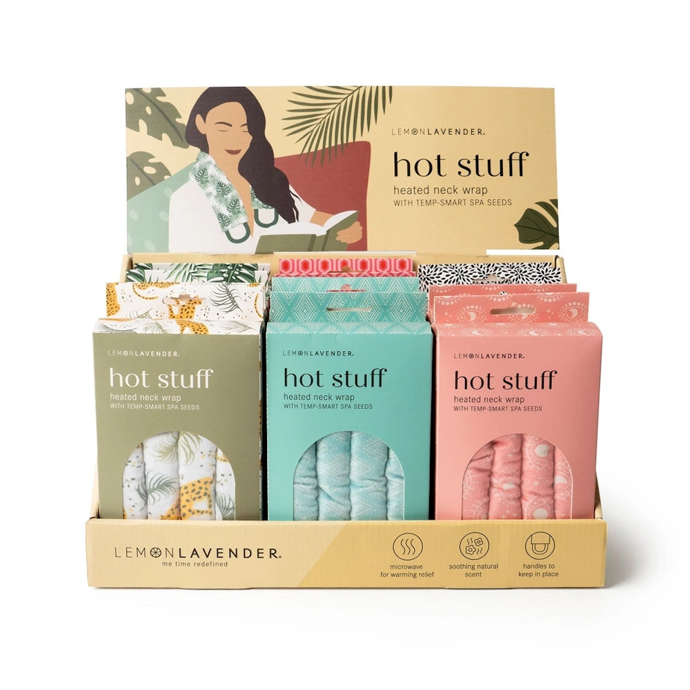 Lemon Lavender Hot Stuff heated neck wraps in a colorful display box with botanical and patterned fabric options.