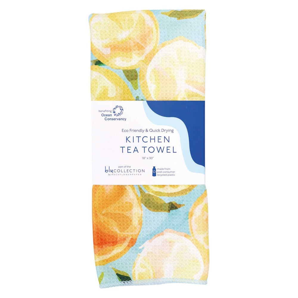 Kitchen tea towel with a yellow lemon slice pattern on a light blue background, featuring Blu Collection eco-friendly packaging.