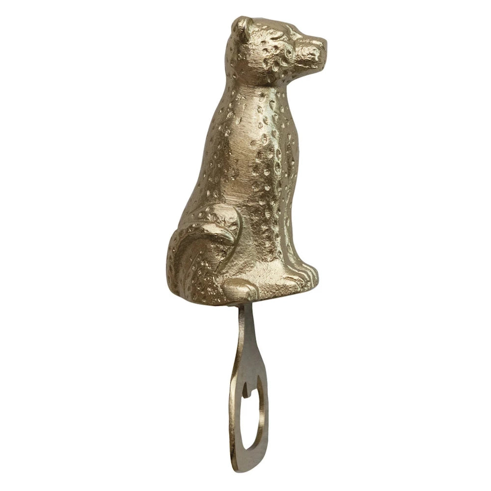 Vintage style brass cheetah bottle opener tool featuring a sitting leopard statue design.
