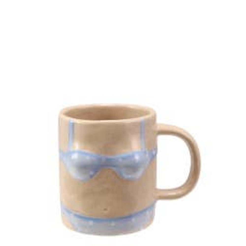 Handmade beige stoneware mug painted with a light blue polka dot bikini design.