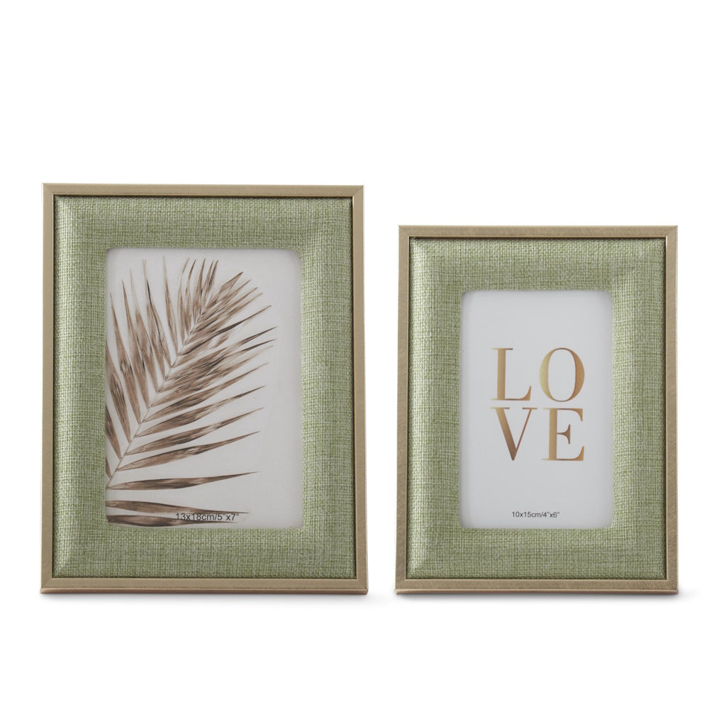 Sage green woven linen photo frames with gold metal trim, featuring a palm leaf and "LOVE" art prints.