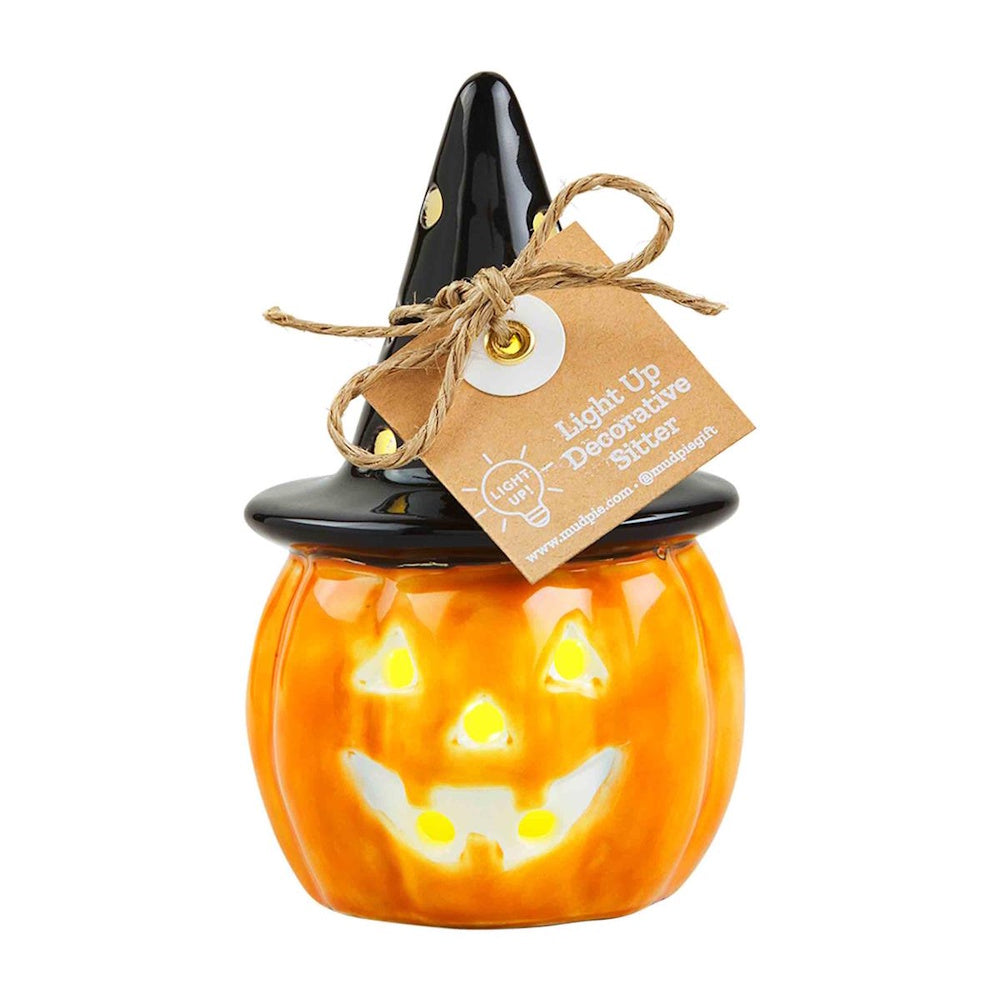 Ceramic light-up witch hat jack-o'-lantern Halloween tabletop decoration with a gift tag.