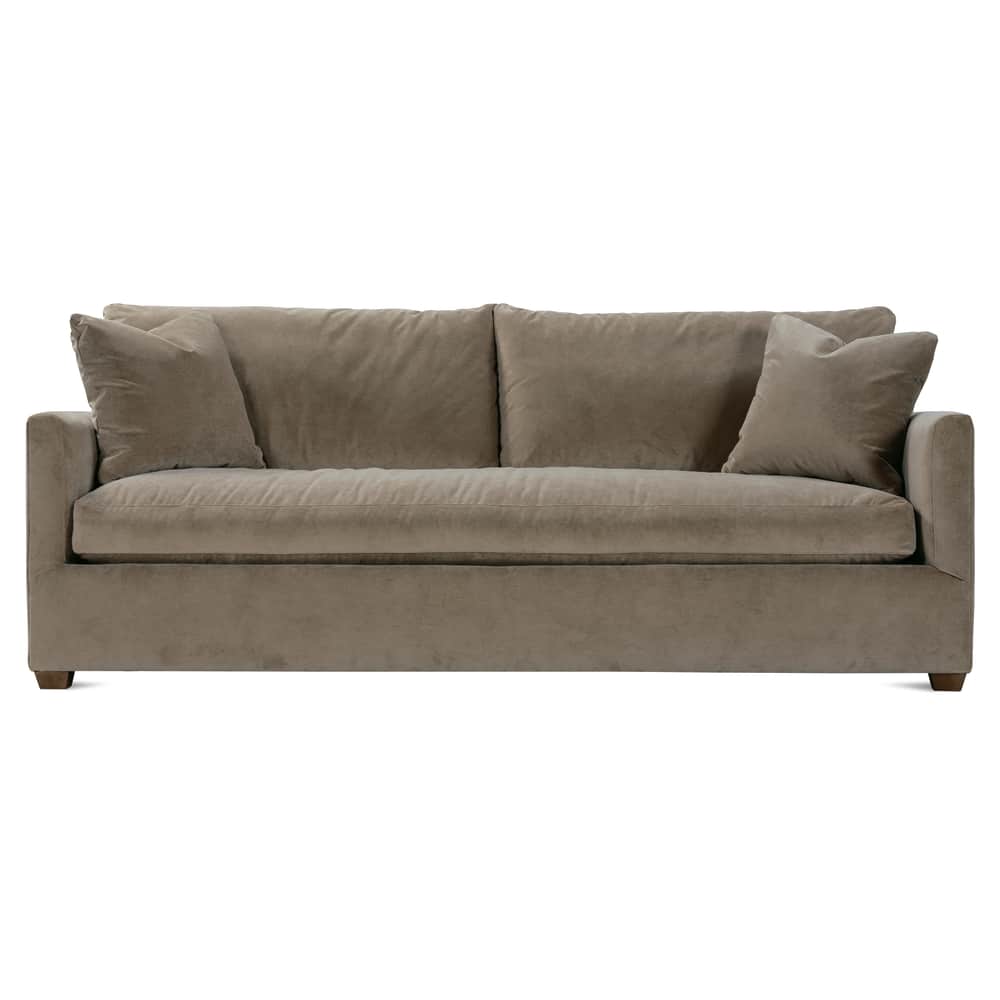 Front view of a modern Lilah sofa in taupe velvet fabric featuring plush cushions and accent pillows.