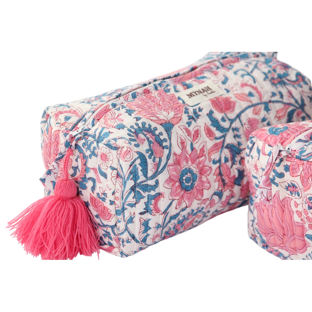 Mynah quilted pink and blue floral zipper pouch with a bright pink tassel.